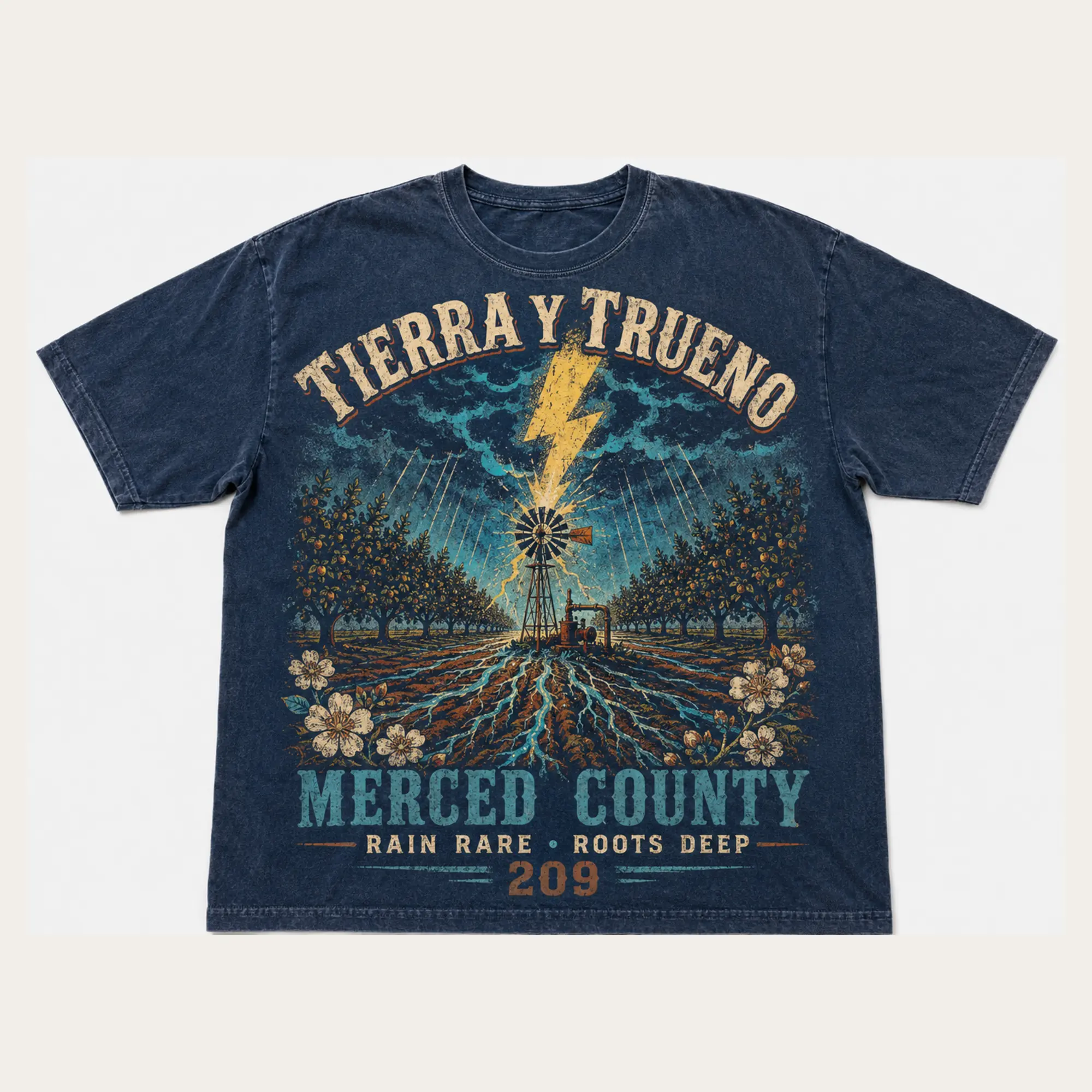 Washed indigo Tierra y Trueno Merced County graphic T-shirt with lightning over orchard rows