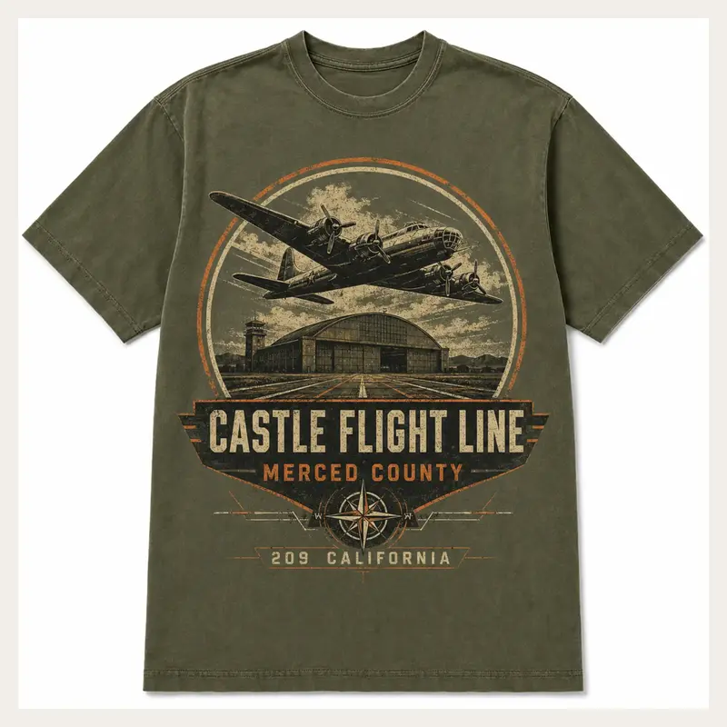 Military green Castle Flight Line graphic T-shirt with a vintage aircraft and hangar illustration